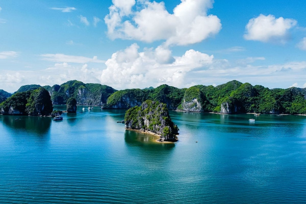 Over 300 limestone karst islands rise from Lan Ha Bay's emerald waters